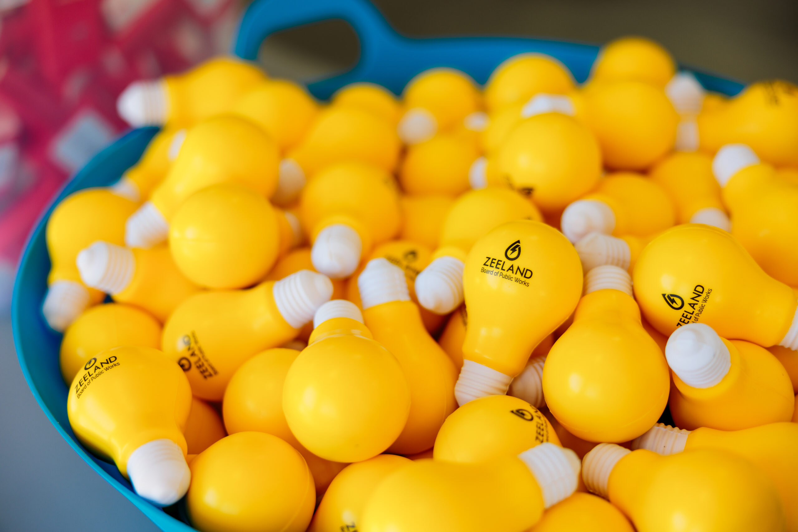 Yellow stress balls in the shape of lightbulbs