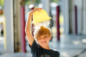 Child's hair standing up from static electricity